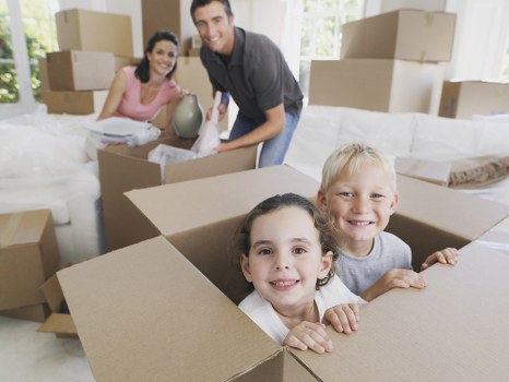 Removal van and moving boxes outside a Bromley home