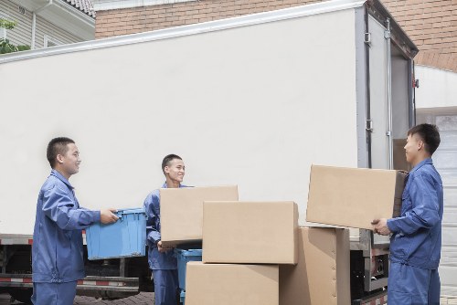 Furniture removal team handling household items in Bromley