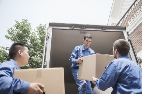 Carefully arranged furniture inside a moving van in Bromley