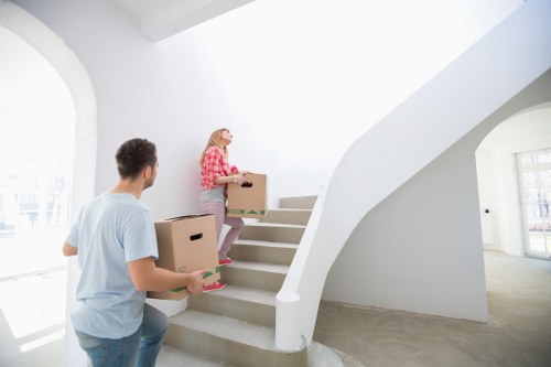 Local movers loading equipment for a Bromley business relocation
