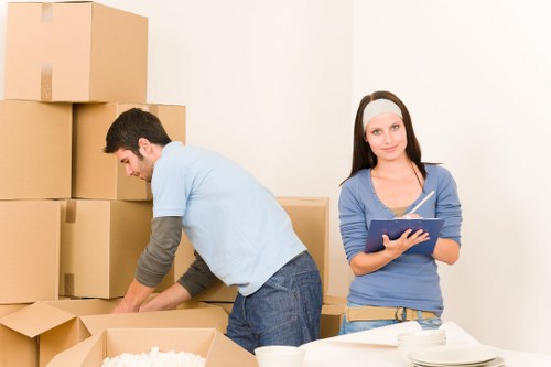 Assorted packing materials including tape, bubble wrap, and labels