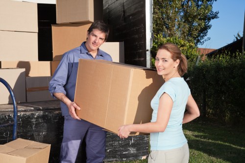 Packed boxes and furniture ready for transport by removal company
